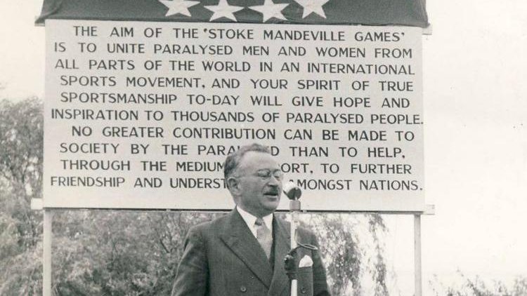 Paralympics's tweet photo. The Paralympic Movement is 73 today! 🎉

Sir Ludwig Guttmann pictured speaking at the Stoke Mandeville Games. The inaugural competition took place on this day, 29 July 1948, the same day as the start of the #Olympics in London. 

This annual event became the #Paralympics. https://t.co/d3k5FmS8l9