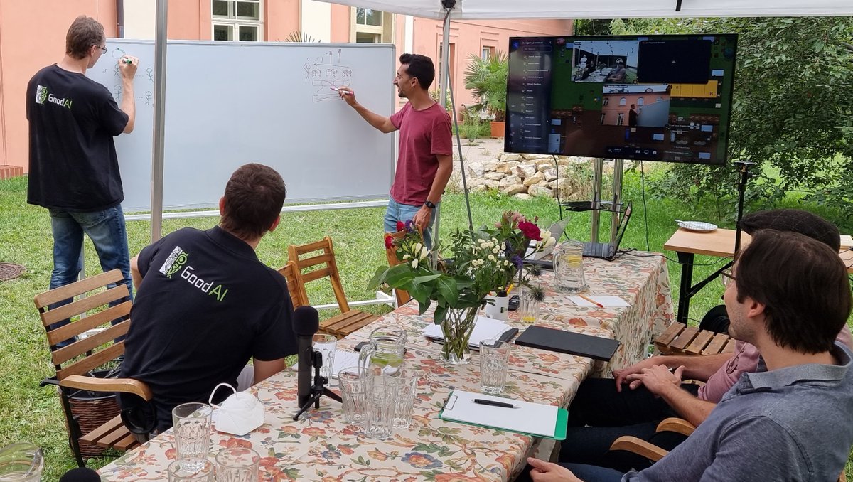 GoodAIdev's tweet image. Ice breaker this morning at the Badger Seminar! Can anyone figure out what they are trying to draw?