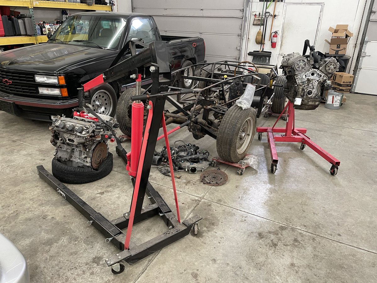 EricTheCarGuy's tweet photo. Here is how the day is beginning. Old engine is out and on the stand ready for tear down. New engine is ready to mate to transmission and be reinstalled. Hope to have it running by day’s end. #etcgshop #fixingitforward #hondaodyssey #engine https://t.co/tDgdGoh6v5