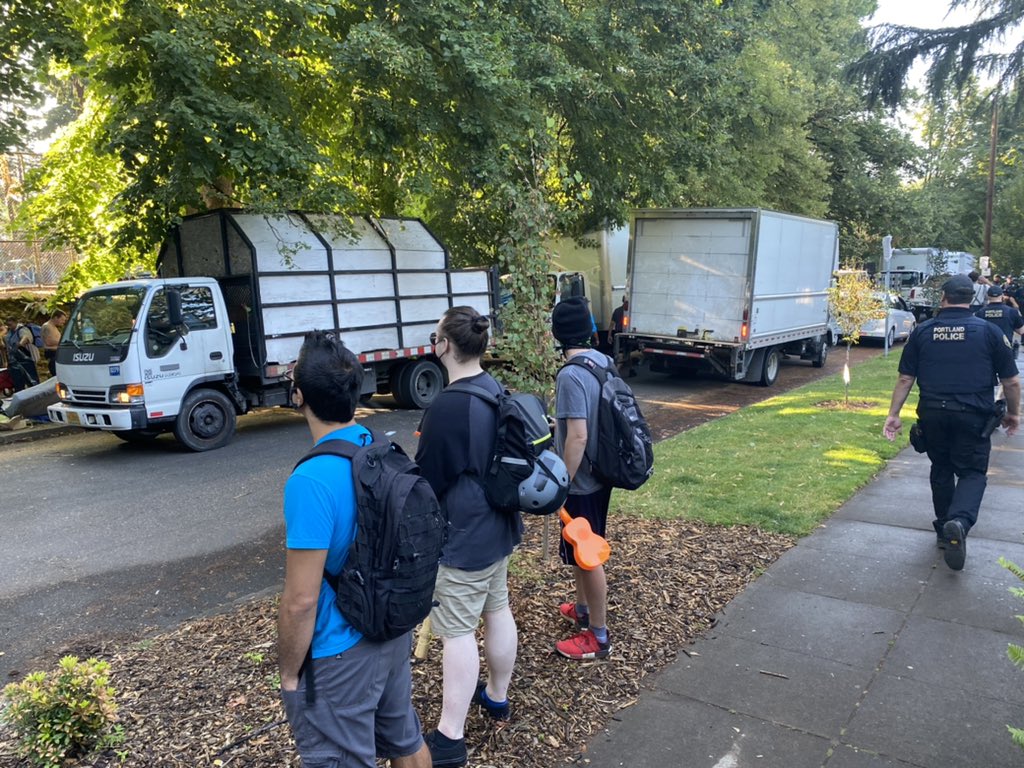 “Please get back on the sidewalk.”

<a href="/PortlandPolice/">Portland Police</a> attempt to move activists off of SE 37th Ave at Oak, near Laurelhurst Park.

Officers &amp; park rangers just showed up with at least 7 Rapid Response Bio-Clean trucks (the firm the city hires to clear homeless camps).
