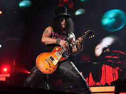 Happy Birthday & Celebrate well Keep playing guitar i heard it helps you stay young . You Rock Slash . 