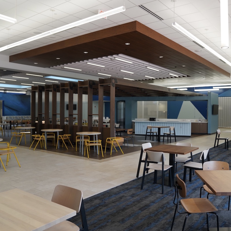Newly re-designed Perkins Student Center, showcasing architectural design features and new, bold furniture.