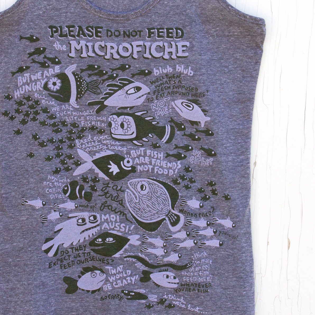 MumbleTease's tweet photo. I used some more subtle (but still lovely) ink colours for the ladies tank top version of this silly fishy design. It’s a variation of purple and green, so you can’t go wrong, am I right?! …blub blub…. https://t.co/SQATobQvei