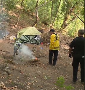 KSBWPhil's tweet photo. This woman was cited for "deliberate negligence &amp; burning" in the #SycamoreGrove area of #SantaCruz.
#SantaCruzFire quickly put the small fire out. Fire crews have sent notifications out to 50 campers that they must move because they staying in high risk fire danger areas. https://t.co/pSvjObaMuX