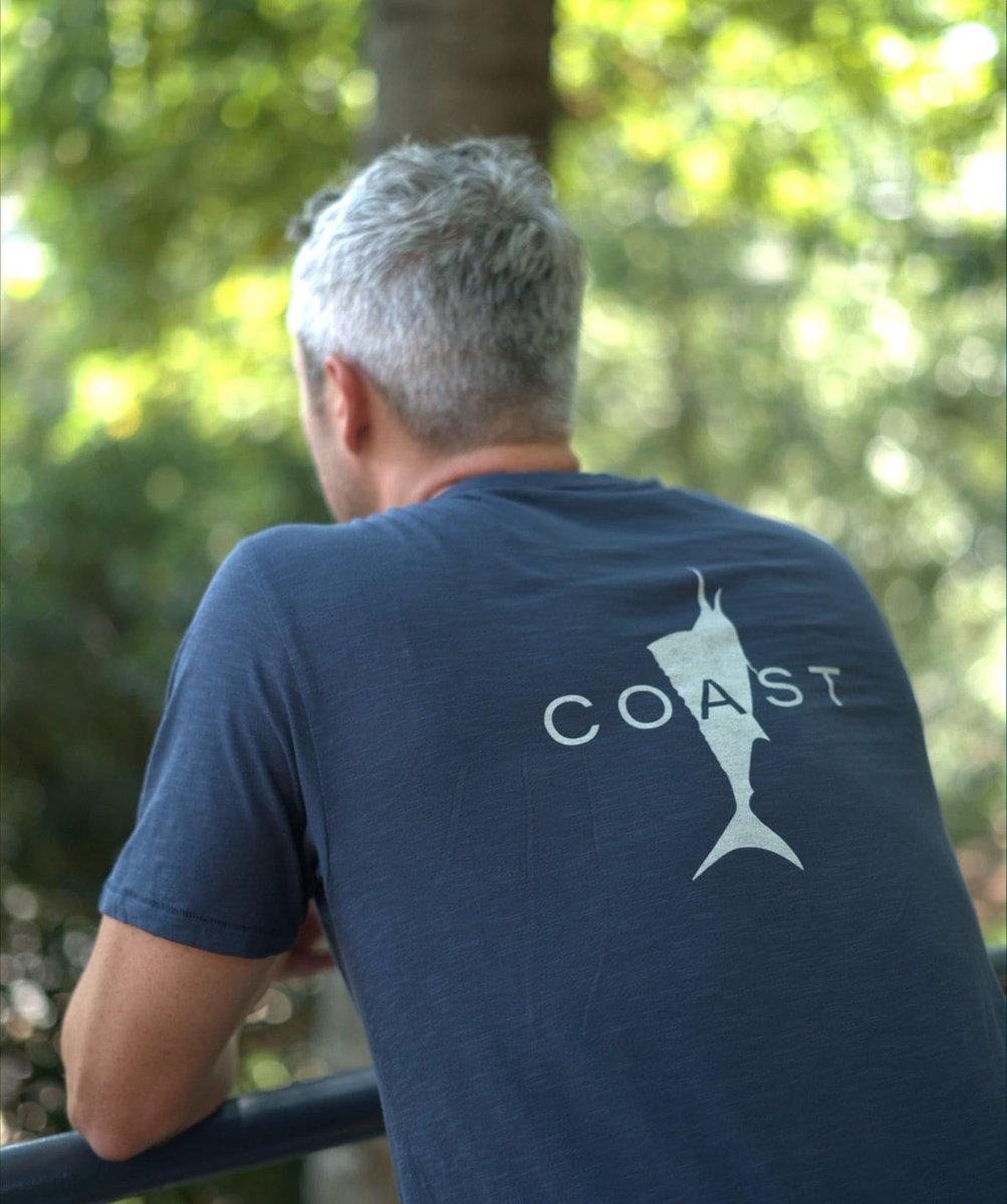 Sharp and to the point the back graphic on the navy Saltwater says it all, just Coast. All Saltwater tees are crafted in extremely soft, light-weight slub fabric.

#CoastBound #DontStressJustCoast #CoastIsClear🦀