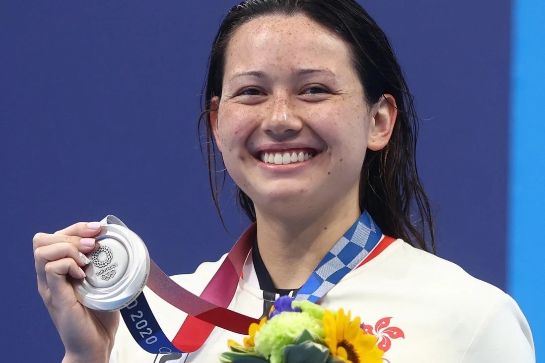 HKGlobalConnect's tweet photo. Another #silver medal for Siobhan and Hong Kong! Siobhan Haughey wins silver in women’s 100m freestyle, making her the first HK athlete to win more than one medal at an Olympic Games! Team Hong Kong continues to make history at #Tokyo2020! https://t.co/7qBA98Crku