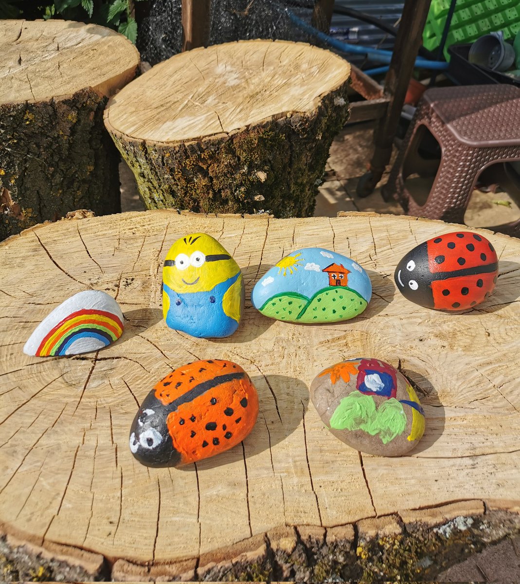 #OccupationalTherapy is at the heart of everything I do! One of my favourite past times is art and what better way to spend the day painting rocks on the allotment ❤️ I also had a little helper with me today! Any more ideas for what we could paint on our rocks? #rockpainting