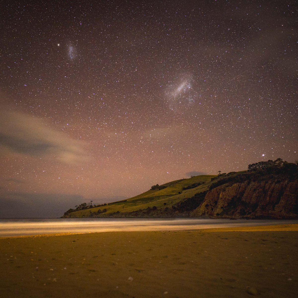 LisaBromfield's tweet photo. Last night I made an impromptu drive to try and image an Aurora (that didn’t eventuate). What’s the saying about when life gives you lemons 🤔…The LMC and the SMC don’t always get the attention they deserve. ✨📸 #magellanicclouds #tasmania #darkskytasmania #nikon #nightscapes https://t.co/MZsuRSnOZY