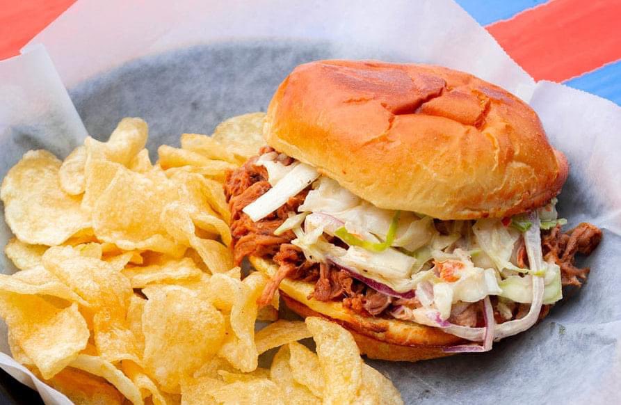 Make your weekend plans at Lost Rhino! We've got plenty of good eats, like our pulled pork sandwich with homemade slaw, and craft brew. Also featuring live music by @WimTapley tomorrow, 2-5 pm! #lostrhinobrewery