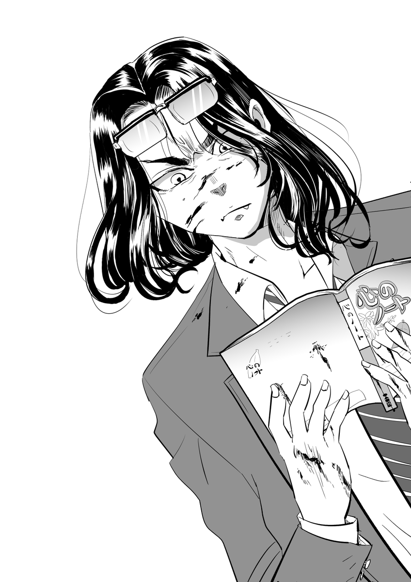 心のノートを読む場地さん 