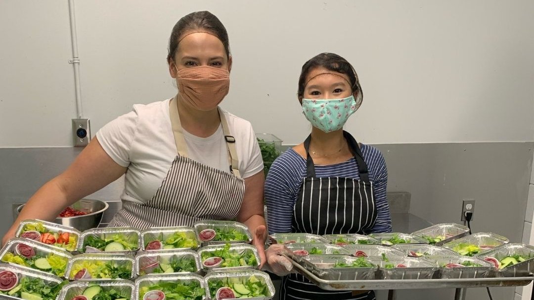 How are you getting involved with your community this summer? YPI youth Cassidy (left) and alumni Erinn (right) have been volunteering at The Station Food Hub - here they are making salads for a local school!