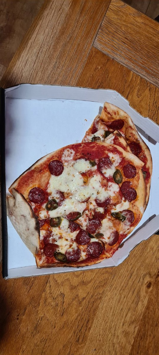 So <a href="/Deliveroo/">Deliveroo</a>, this is how my <a href="/PizzaExpress/">PizzaExpress</a> Pizza has turned up. Not acceptable, they obviously didn't have the right size box so cut the pizza into smaller slices. Also our dough sticks were missing. What can you do please?