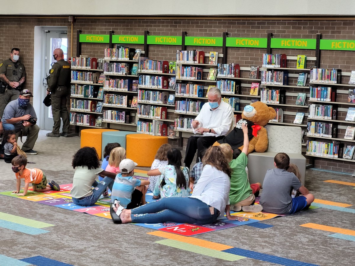 WashoeLibrary's tweet image. Following @GovSisolak 's special Story Time at the Downtown Reno Library, the governor took some time to answer the kids questions, like favorite pizza! (Turns out it's veggie) #SummerReadingChallenge #tailsandtales