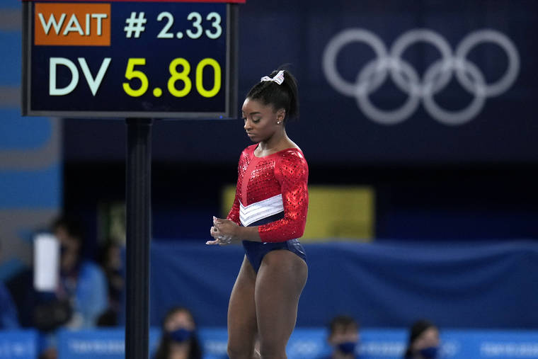 Simone Biles out of vault and uneven bars; beam and floor possible at Olympics