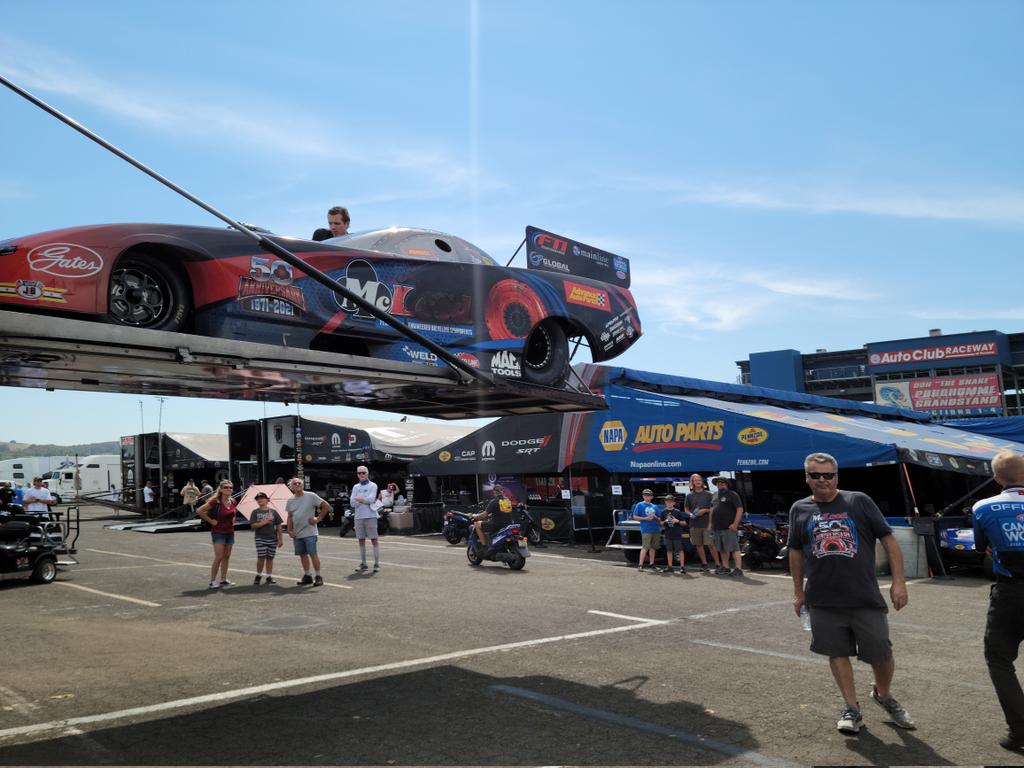 Paul_Lee116's tweet photo. Good afternoon from Auto Club Raceway! The @McLeodRacing / #FTIperformance Funny Car is getting unloaded and ready for Q1 at the #WinterNats! #NHRA #McLeodEquipped https://t.co/GEPhcGiwO3