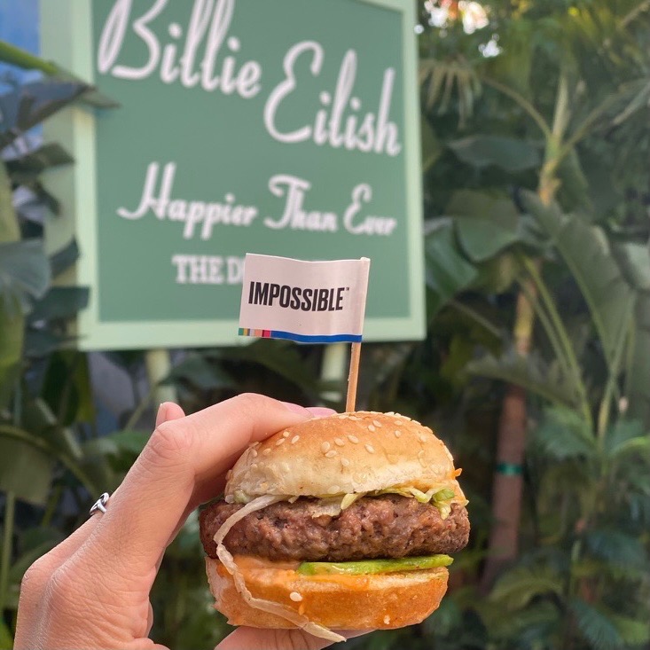 ImpossibleFoods's tweet photo. Happier than ever with burgers in-hand and @billieeilish  in our ears. #HappierThanEver https://t.co/24GqouD8oS