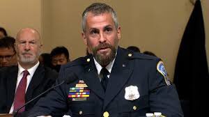 Who is the guy on the left of Fanone?