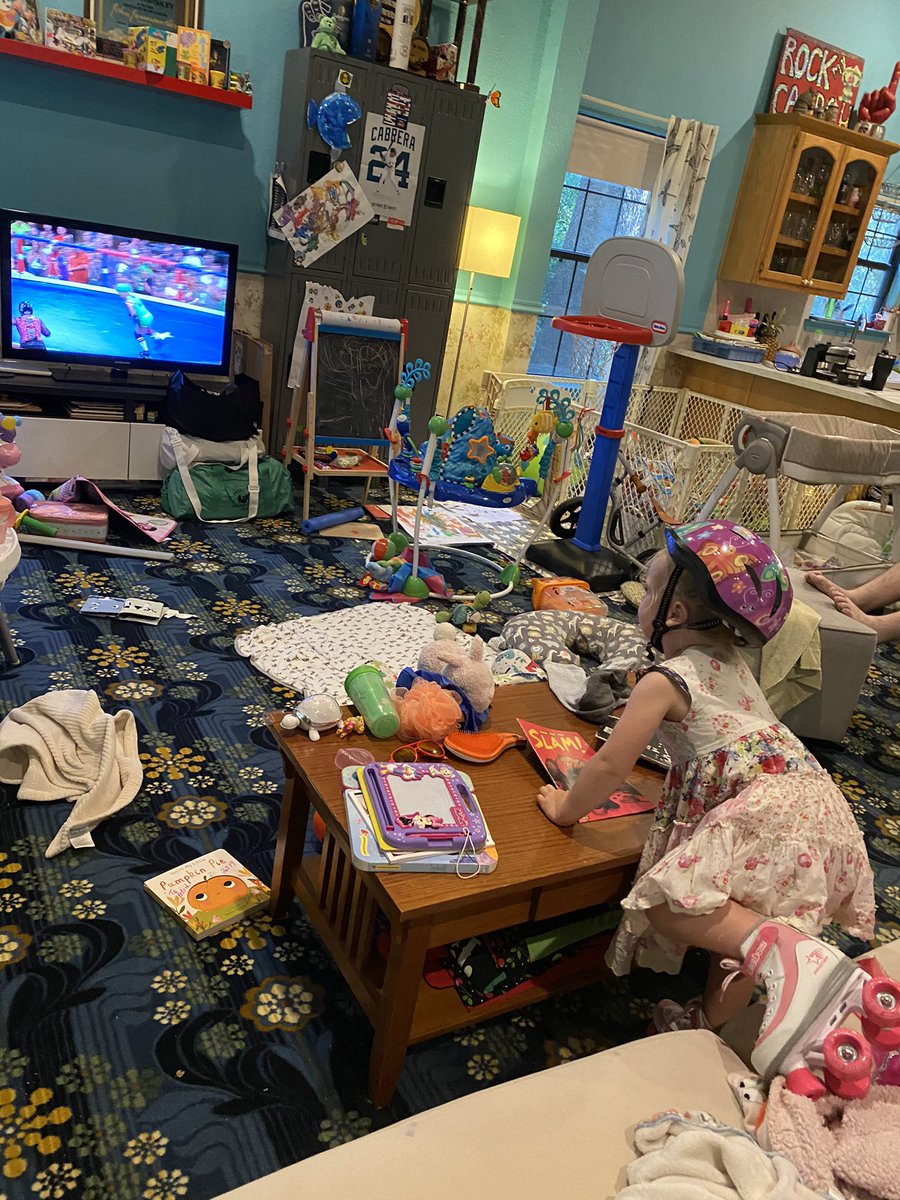 RockyCasbahTXRD's tweet photo. Yesterday, I come home from work to this: Daughter watching @TXRDRollergirls videos, wearing her helmet and roller skates, and reading her roller derby comics (SLAM!) 🛼💚 I love this girl!! #TXRD #BabyBomb #FutureDerbyGirl https://t.co/gUzLsrhQjm