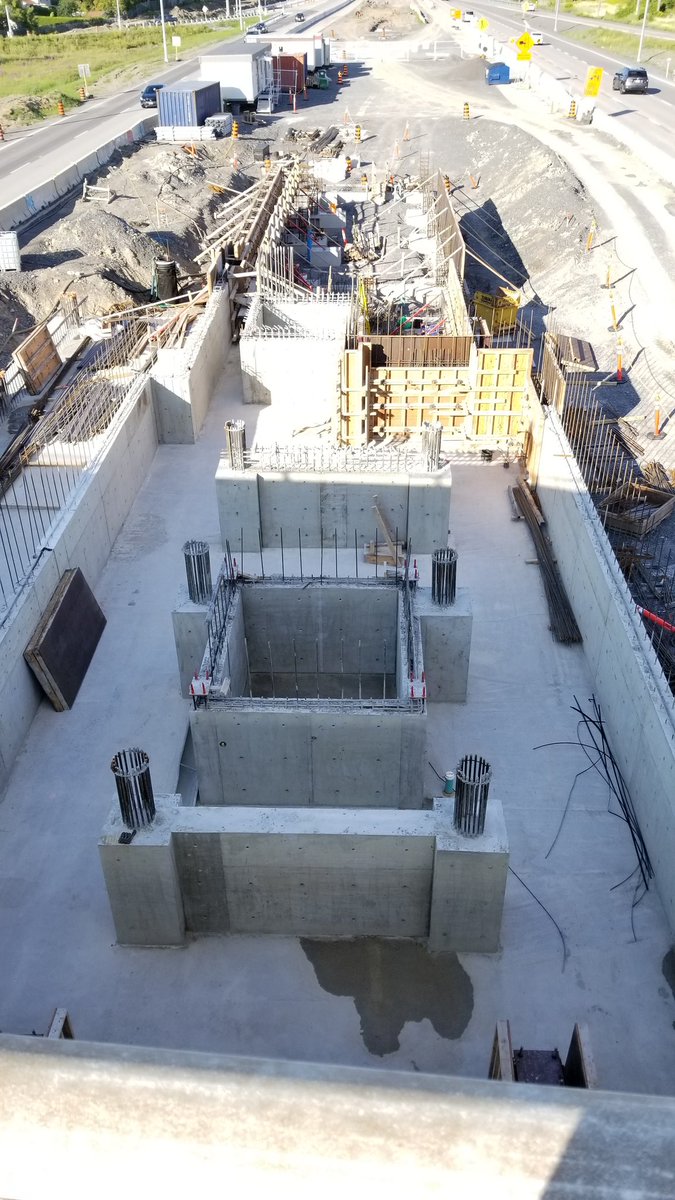 RHFayad's tweet photo. Finally starting to see the first Orleans-based O-Train station taking shape at Jeanne D'Arc on Ottawa's Eastern Stage 2 Extension! Also a bonus picture of how close they are to starting the one at Place D'Orleans! https://t.co/bvV2UOKf76