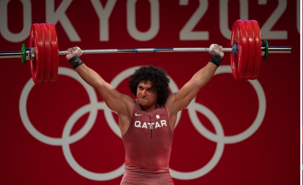 китайский штангист люй сяоцзюнь. ли атлетика. ли атлетика. ли атлетика. российские прыгуны в высоту.