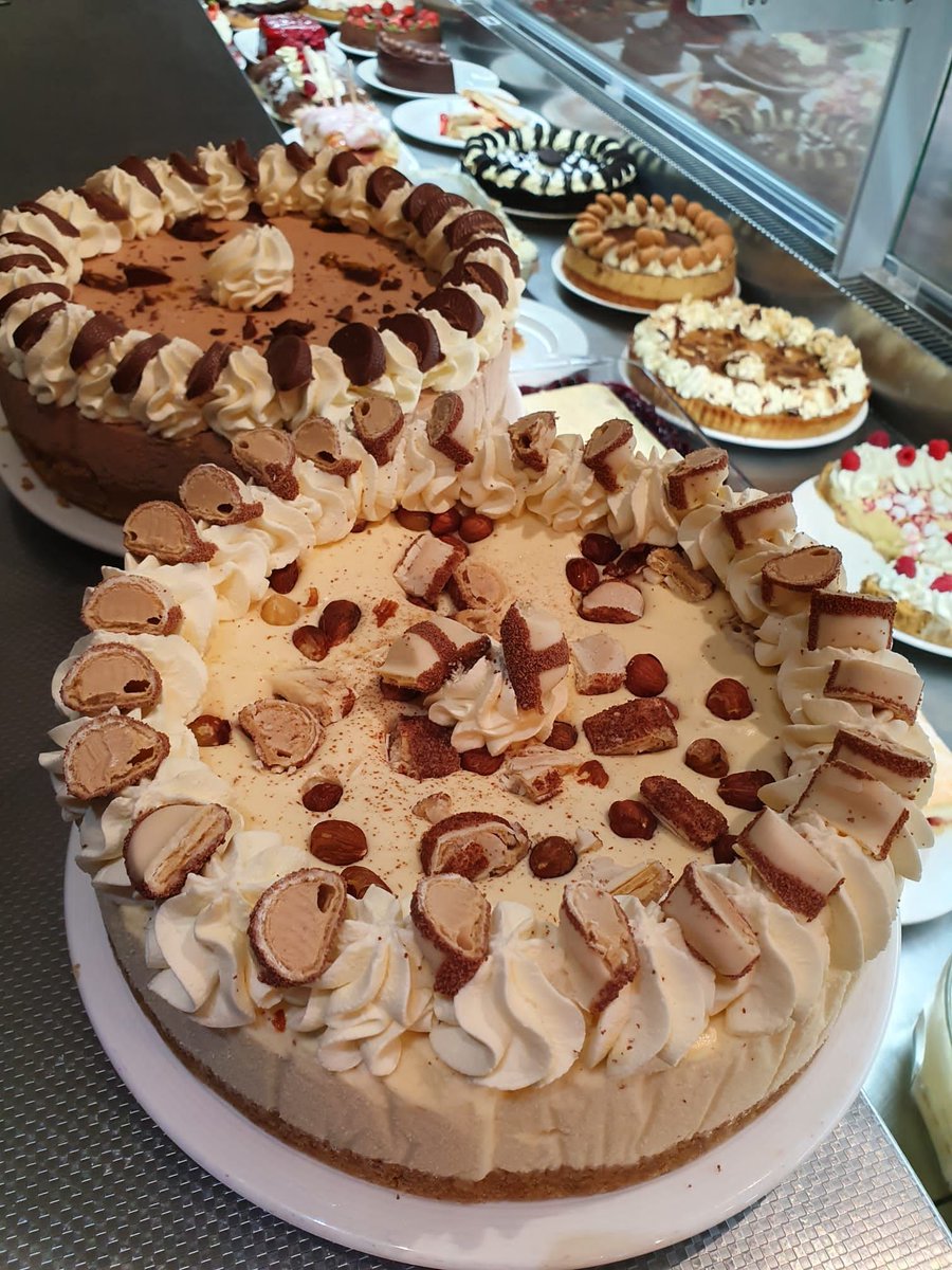 Are you ready for your jaw to hit the floor? Introducing our white chocolate kinder bueno and chocolate orange cheesecakes. Marvel at their beauty. If they don't get the stomach grumbling we dont know what will.
