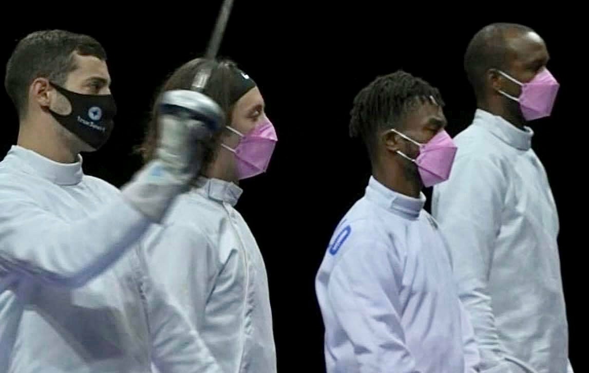 The USA mens epee fencing team wore pink masks to show solidarity with sexual assault victims, except for Alen Hadvic who has been accused of a number of rape incidents spanning three years and by three different women.