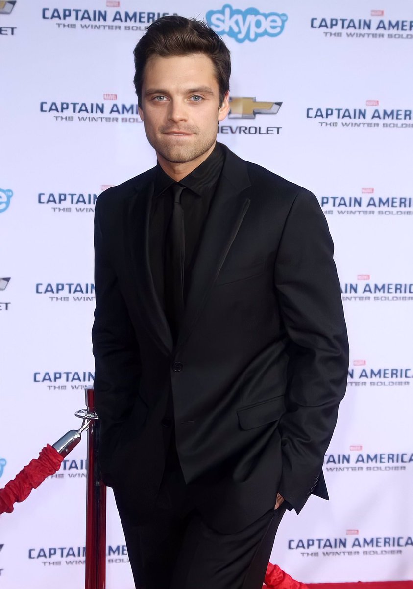 hourlyseb's tweet image. Sebastian Stan in a black suit