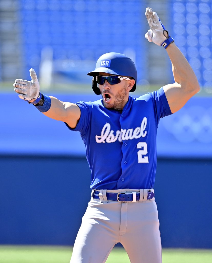 WBSC's tweet photo. 🇮🇱🇮🇱🇮🇱🇮🇱 📸 Historic first-ever Olympic Baseball win for Israel

#Tokyo2020 #baseball #Olympics @israel https://t.co/8xvVlpcAJO