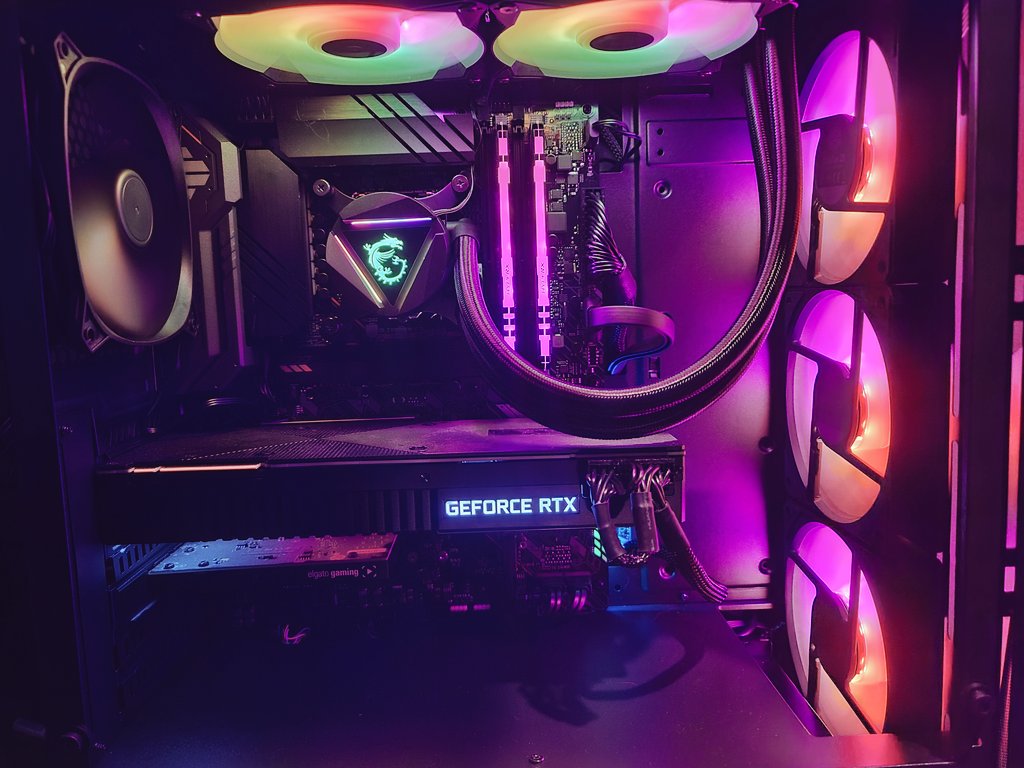 Prawln's tweet photo. 🔥Intel i9 11900K Has Been Installed🔥

With a base clock of 3.50Ghz and 5.30Ghz turbo. Intels new i9-11900K CPU has my gaming rig ready to take on anything I throw at it! 😍

Also how freaken good does this RGB look 😍😍

#poweredbyintel https://t.co/XZYEyvlWFN