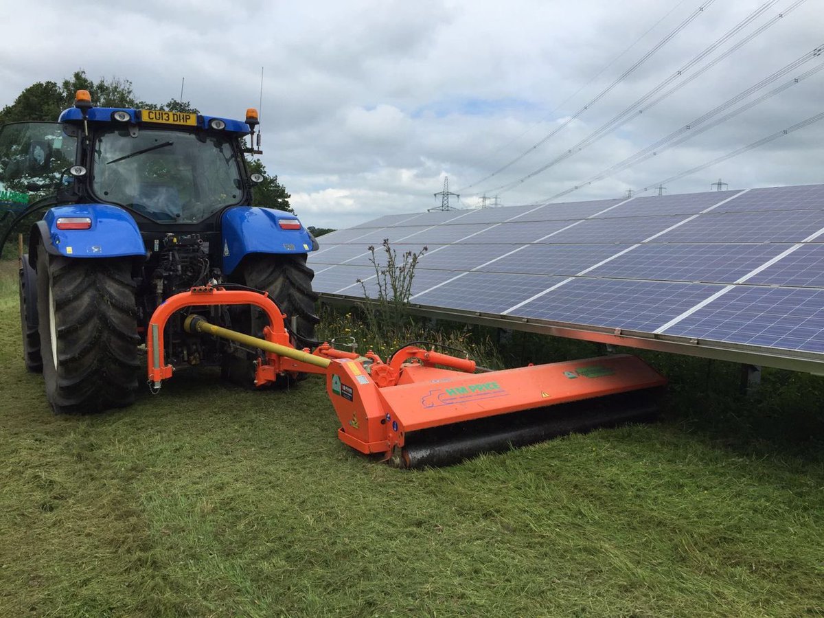 hmpriceltd's tweet photo. Our little and large Newhollands busy on solar farm maintenance. #solar #maintenance   #groundsmaintenance #newholland #agrimaster #renewableenergy #solarenergy #renewables @NHAG_UKandROI @Weaving_Mach https://t.co/sPsTmFWDNc