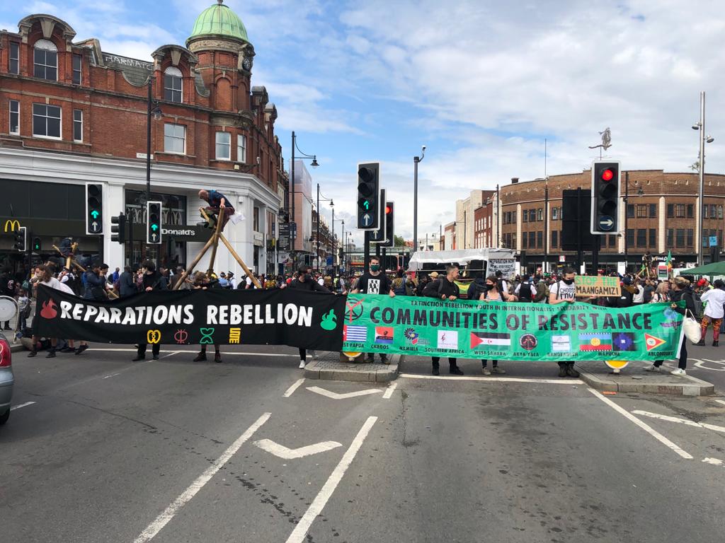 All Roads Must Lead to Our Sacred Cause of Reparations.

Get down to Brixton, the <a href="/ReparationMarch/">Reparations March UK</a> has just taken the road with XR.

Today is Afrikan Emancipation Day, commemorated in the Caribbean and some parts of Africa marking the passing of the 1833 Abolition of Slavery Act.