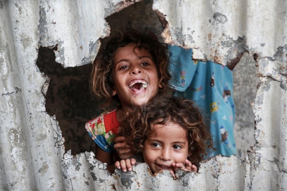 A smile in the middle of the rubble #GazaStrip #Palestine