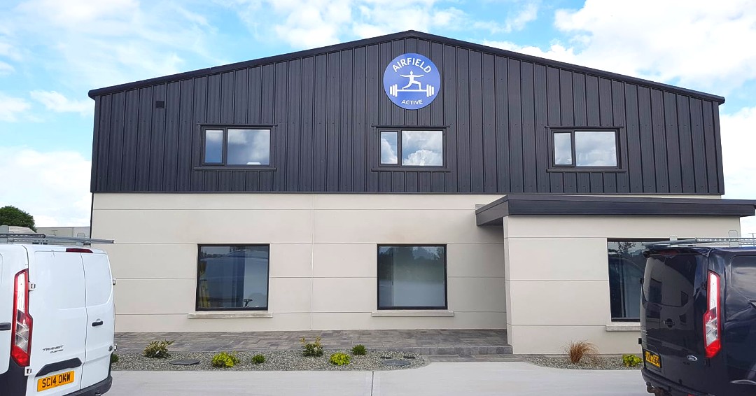 Signtime10's tweet photo. A last touch with a router cut 3mm ACP circle with vinyl applied to the face with gloss laminate fixed to the gable end of the building. https://t.co/KEWXz0UD0n