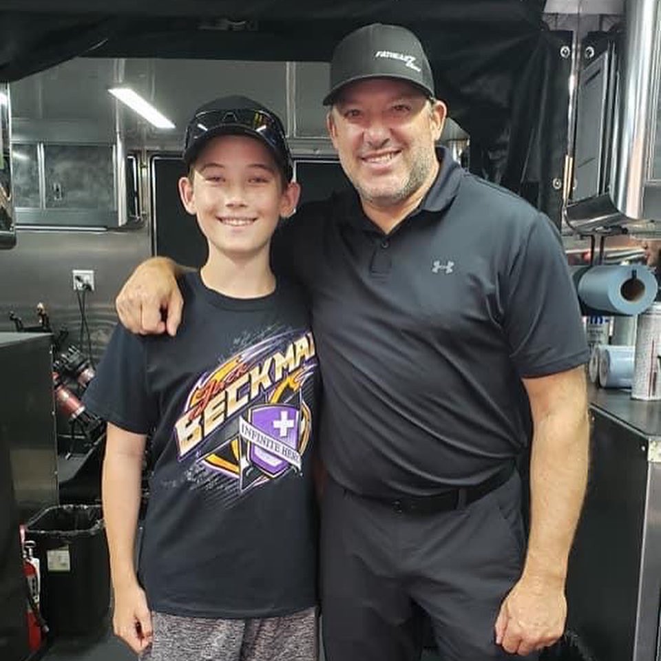 I got to get my hands dirty helping T Buck adjust the mags on the NAPA car (pretty sure they won because of me!), AND even packed Jim Campbell's parachute before the semis (pretty sure they lost because of me), while Jason regaled Tony Stewart with go kart racing tips!