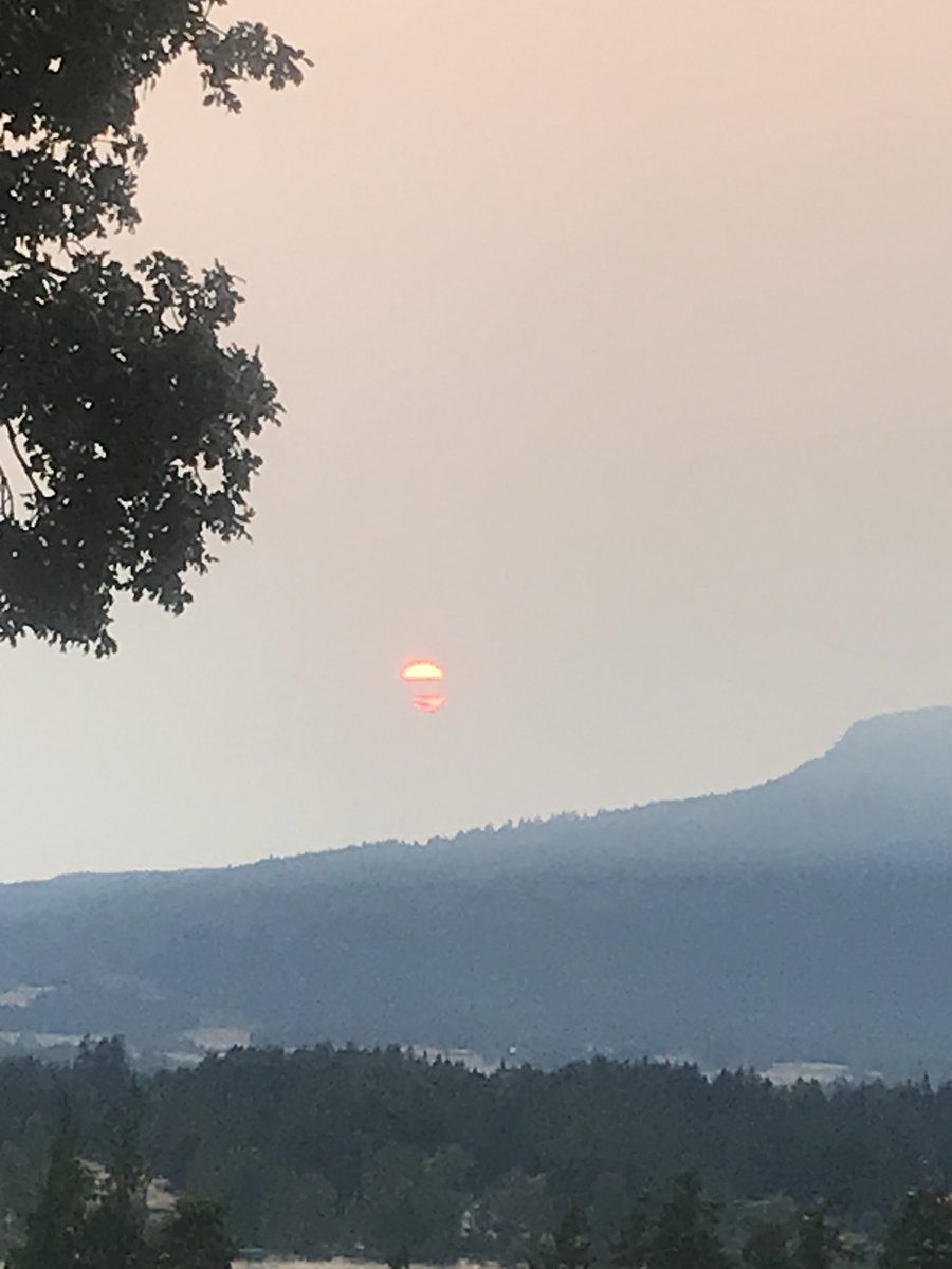 Eerie setting sun in smoky skies