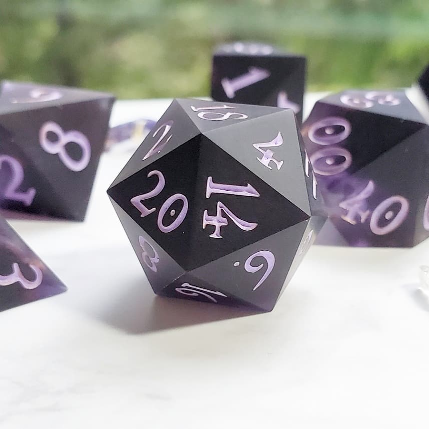 Mizribelle's tweet image. 2k followers?! To celebrate the unfathomable fact that so many of you enjoy my dice enough to stick around, let's have a giveaway!

I happen to have some lovely, secret purple dice for just such an occasion! To enter simply be following me and like/RT this post! Full rules below!