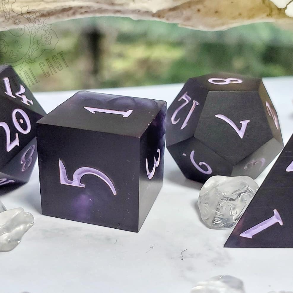 Mizribelle's tweet image. 2k followers?! To celebrate the unfathomable fact that so many of you enjoy my dice enough to stick around, let's have a giveaway!

I happen to have some lovely, secret purple dice for just such an occasion! To enter simply be following me and like/RT this post! Full rules below!