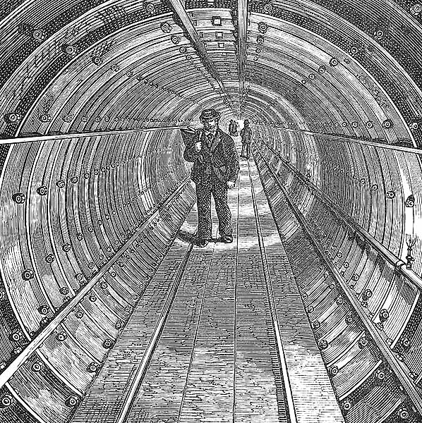 ICELibrary's tweet photo. The Tower Subway under the Thames opened #onthisday 1870. The tunnel was dug using a cast iron tunnelling shield developed by Peter Barlow and James Henry Greathead. The subway was a cable hauled wooden carriage which proved uneconomical and closed by end of the year. https://t.co/kmyCXtKb7W