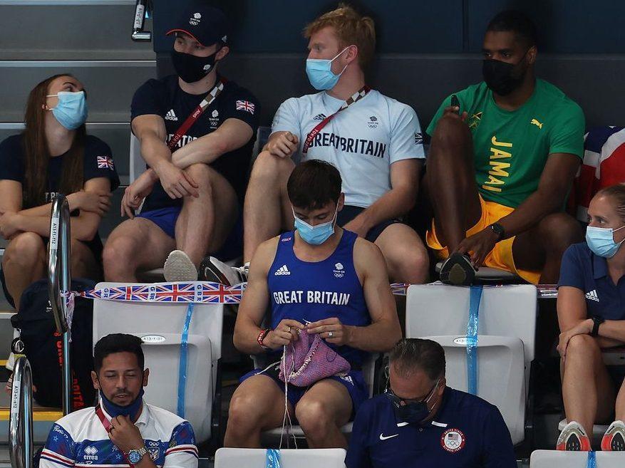 Diver Tom Daley knitted dog sweater while watching Olympics in the stands