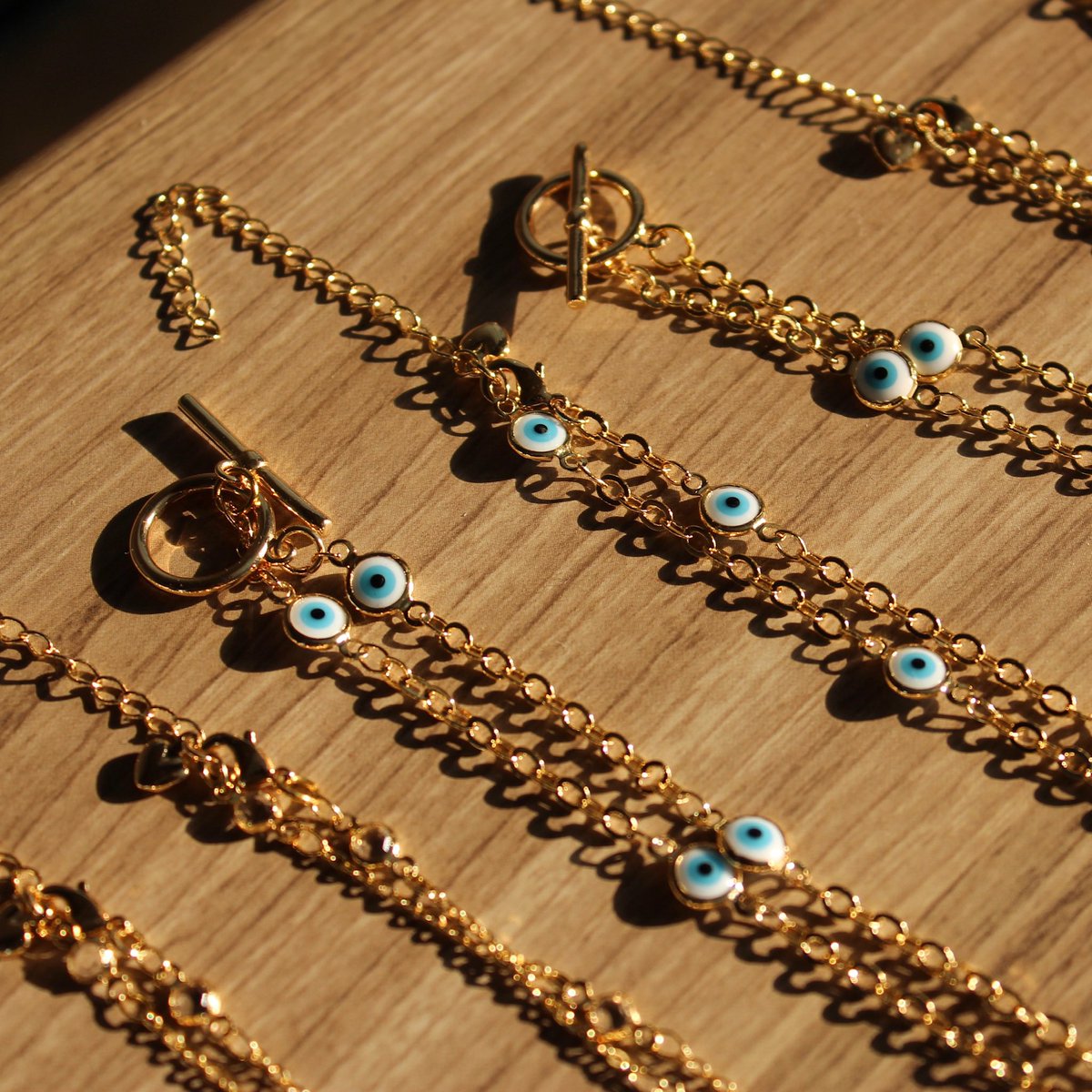 bignicenergyy's tweet photo. these stunning evil eye chains coming back in stock tomorrow @ AntheiaMtl 🧿💫 https://t.co/hMcZ9POeNu