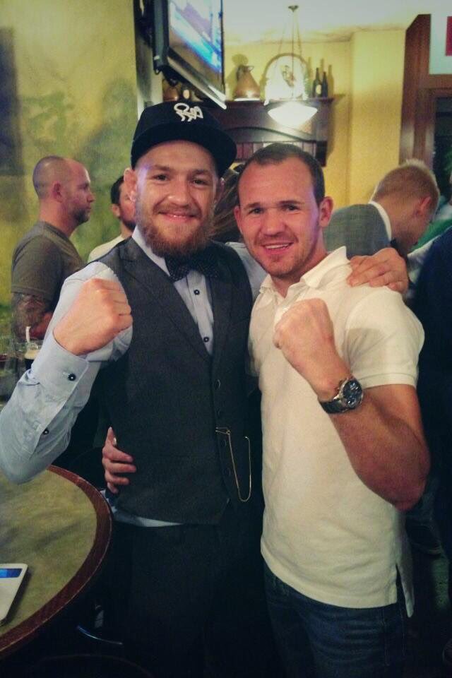 Pajpunisher's tweet photo. On this day 8 years ago with the wife @mrs_hyland14 we where in Boston to watch @TheNotoriousMMA beat Max Holloway. Even done his ACL during the fight and still one! What a great night even went to the after party ha 👊🏼 #ProperChamp https://t.co/wfBrBaIfqN