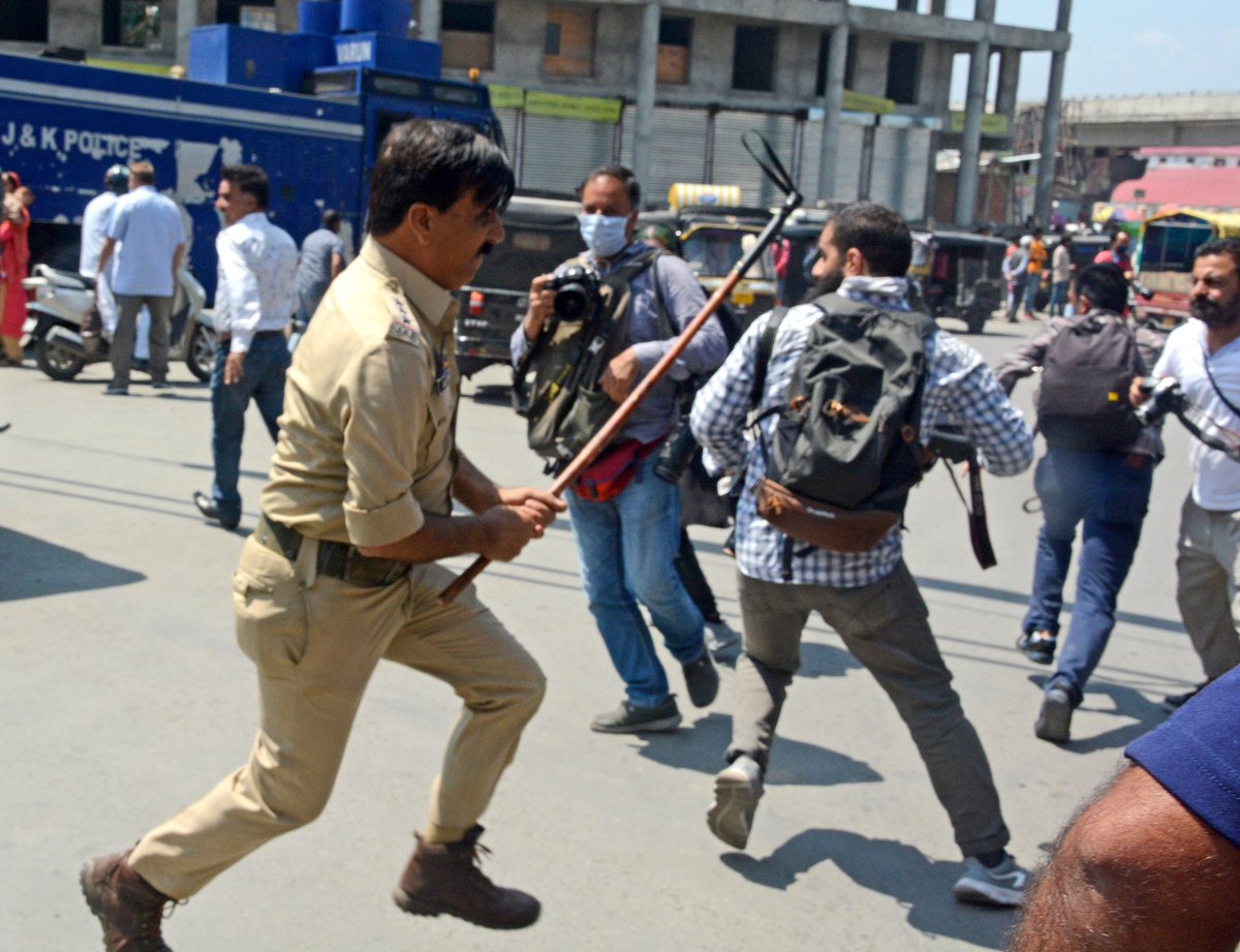 In pictures: Police thrash journalists while covering Muharram procession at Jahangir Chowk, Srinagar.