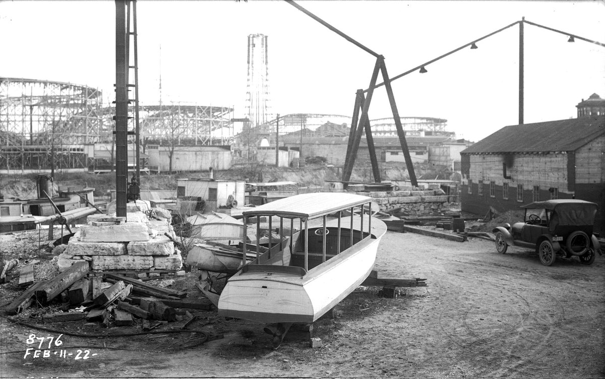 Historical Photo of the Day: A view to the east showing a shipyard on the west side of the North Branch of the #ChicagoRiver, just north of Belmont Avenue, on February 11, 1922. Some of the rides at #RiverviewPark are visible in the background.