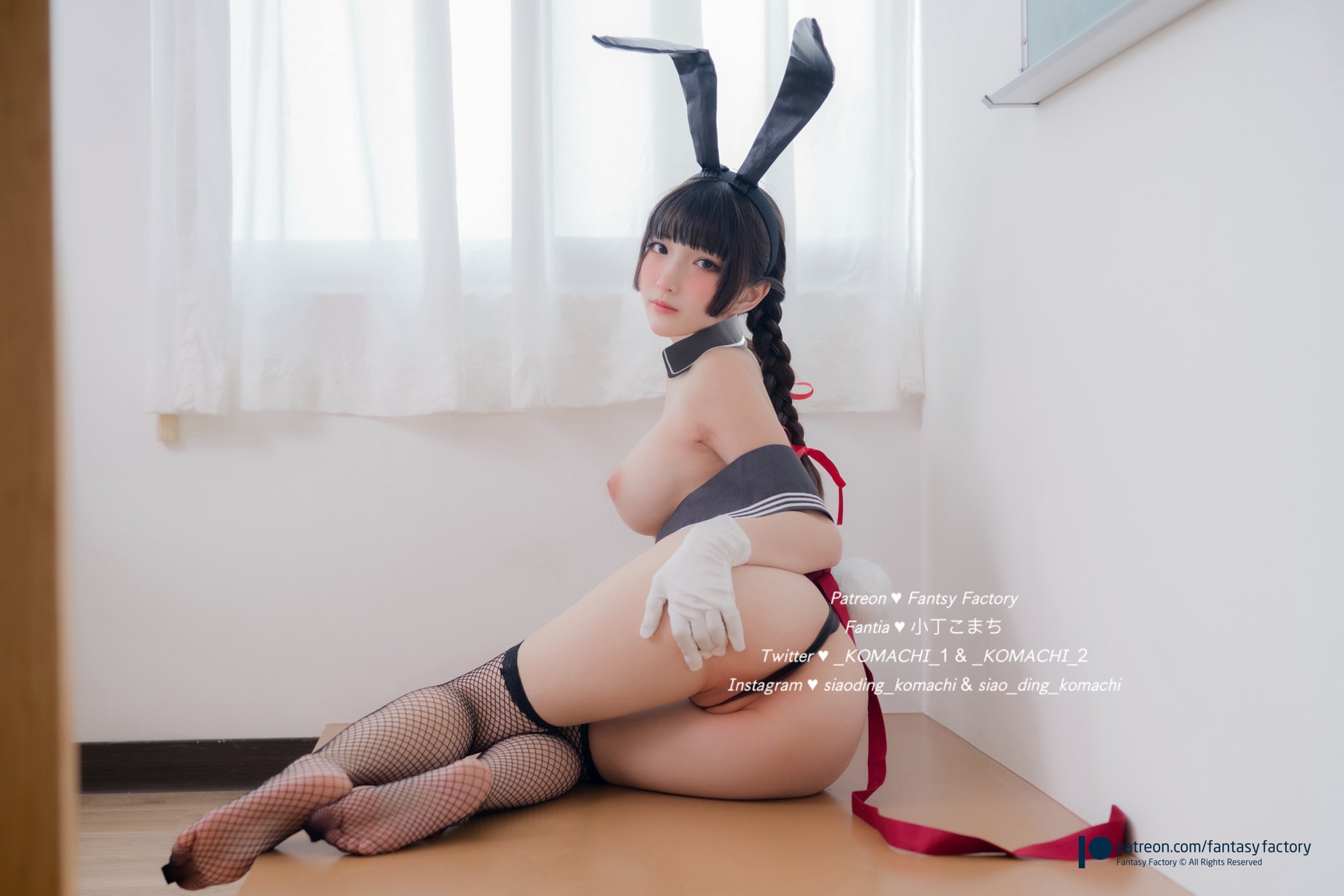 Komachi relaxing provocatively in bed