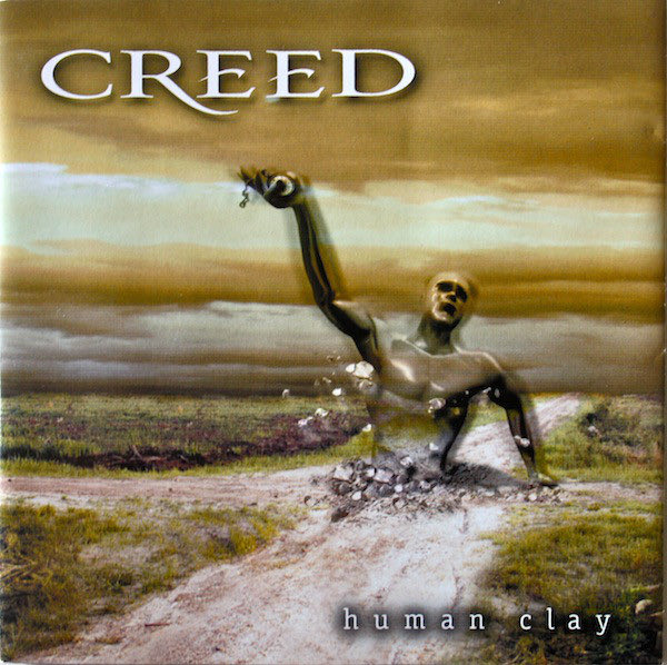 ReallyBLBootsy's tweet photo. Sure, Creed is the lowest hanging fruit of bands to ever make fun of. But there’s just no forgiving the photoshop work on their album covers. I mean, it wasn’t THAT long ago https://t.co/RtfCSrj1yX