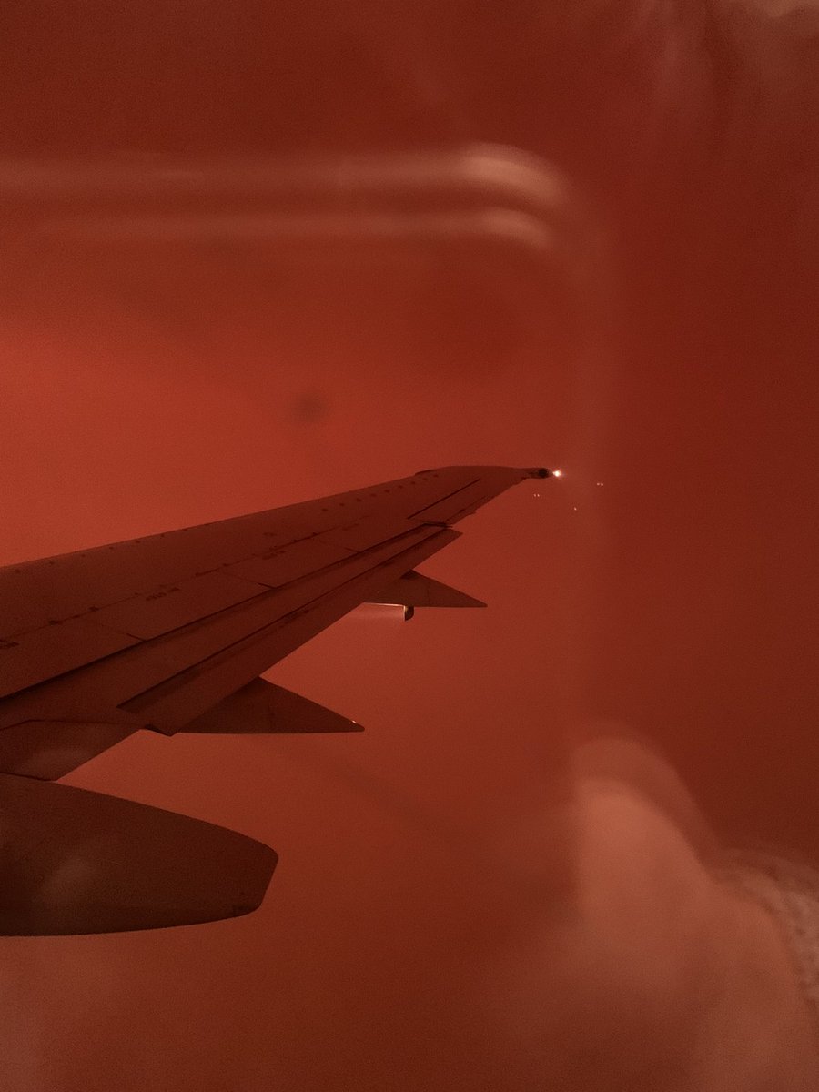 So I just flew over and then through hell between Vancouver and Kelowna. At one point it was pitch black outside the plane window (at 4:30 pm) and the inside of the cabin smelled like a campfire. #bcwildfires #nofilter