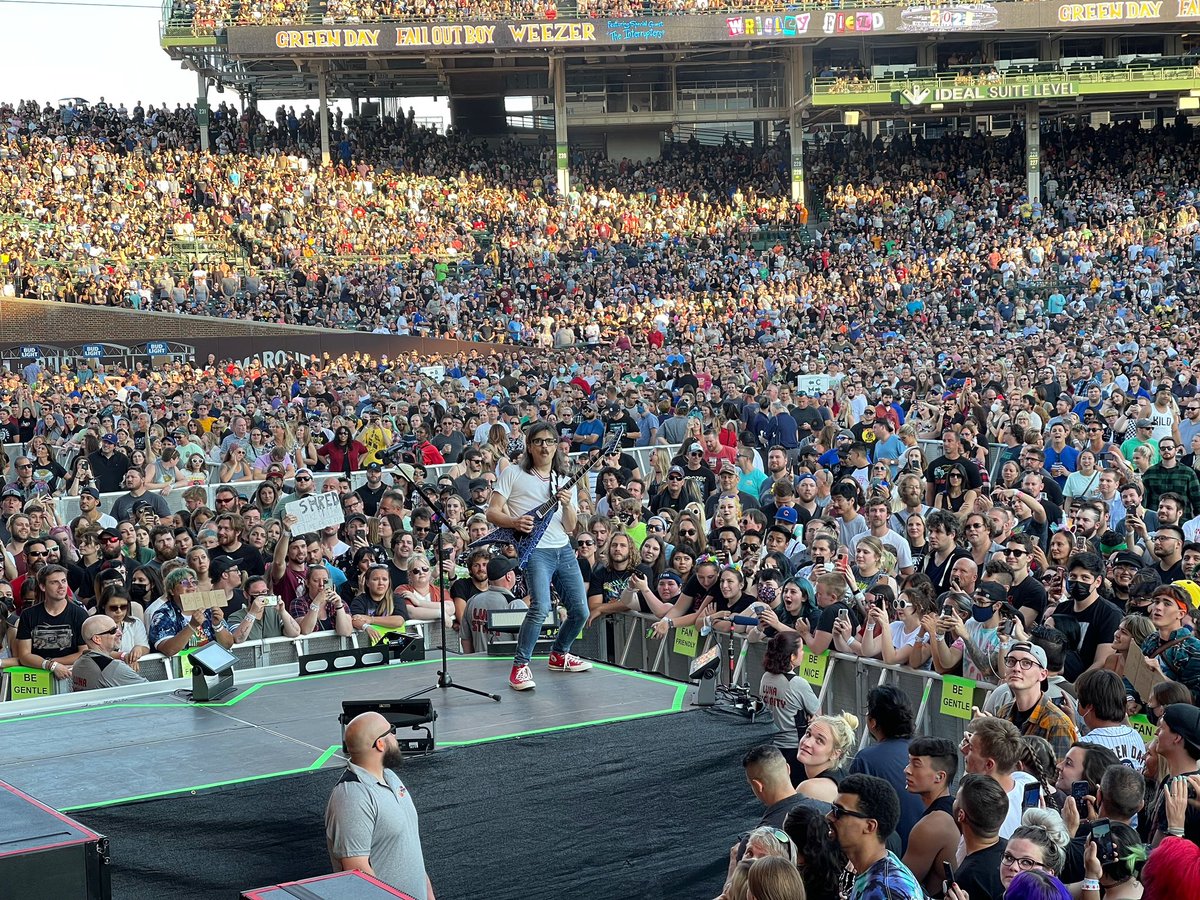 Weezer's tweet photo. We’ve played across the street at The Metro many times, always seeing Wrigley and wondering if somehow we’d ever play there. Tonight it finally happened! Thank you Chicago for making us feel so welcome! @hellamegatour #karlscorner https://t.co/vjc8gd7bj7