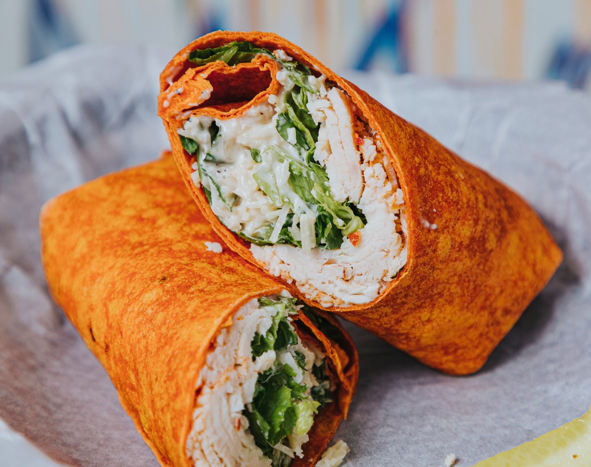 empirestatedeli's tweet photo. Have you tried our Spicy Chicken Caesar Wrap? It's made with Blazin' Buffalo Chicken wrapped with Romaine Lettuce, Parmesan Cheese, &amp; Caesar Dressing.⁠
⁠
#sogood #whatsforlunch #delilife #lunchtime #delicatessan #spiceisnice #spicy #neworleans #lunch https://t.co/JaiWbMjc19