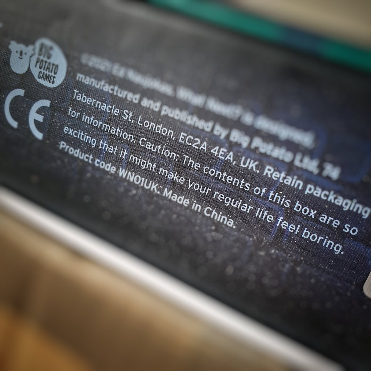 Warning reading: Caution: the contents of this box are so exciting that it might make your regular life feel boring.