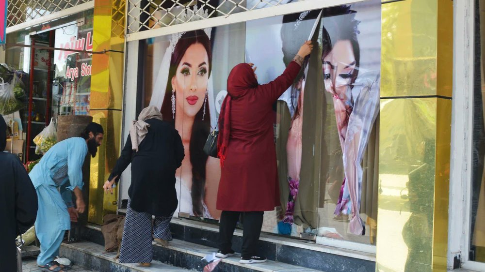 VICEWorldNews's tweet photo. Photos of women on businesses in Kabul have been removed, as the Afghan capital falls under Taliban control.
Read more: https://t.co/FOnJycuemD https://t.co/SmWH0r21ui